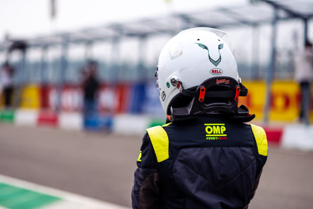 Avi Malavalli watching the track in his racing helmet
